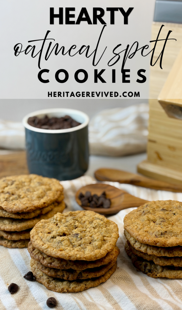 stacks of cookies on tea towel with ingredients and harvest mill in background.