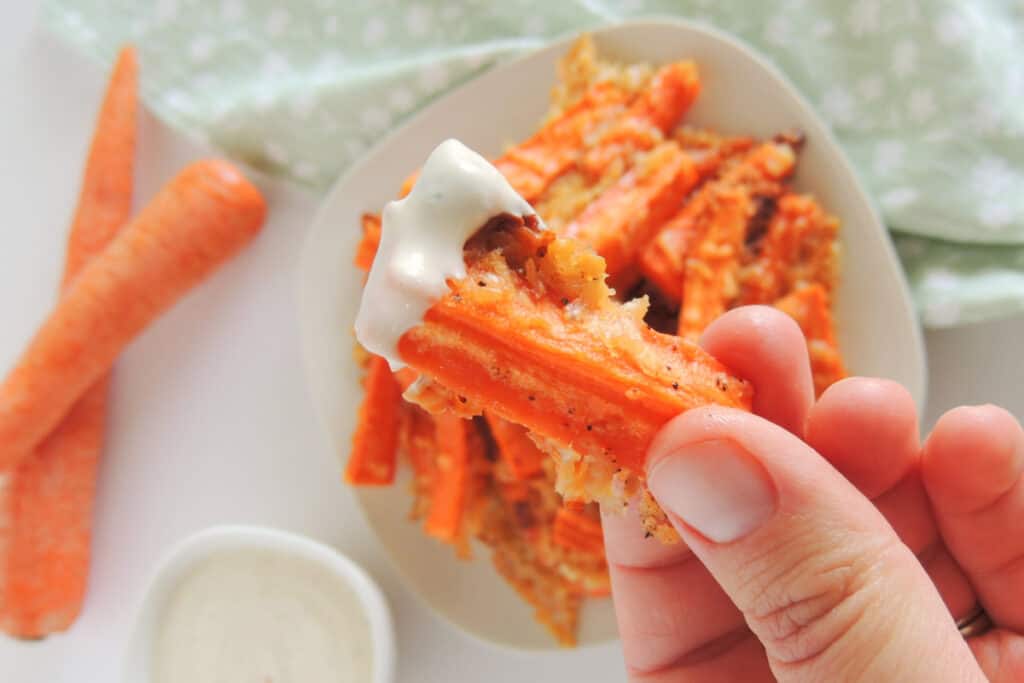 Crispy parmesan carrot sticks dipped in ranch dressing.