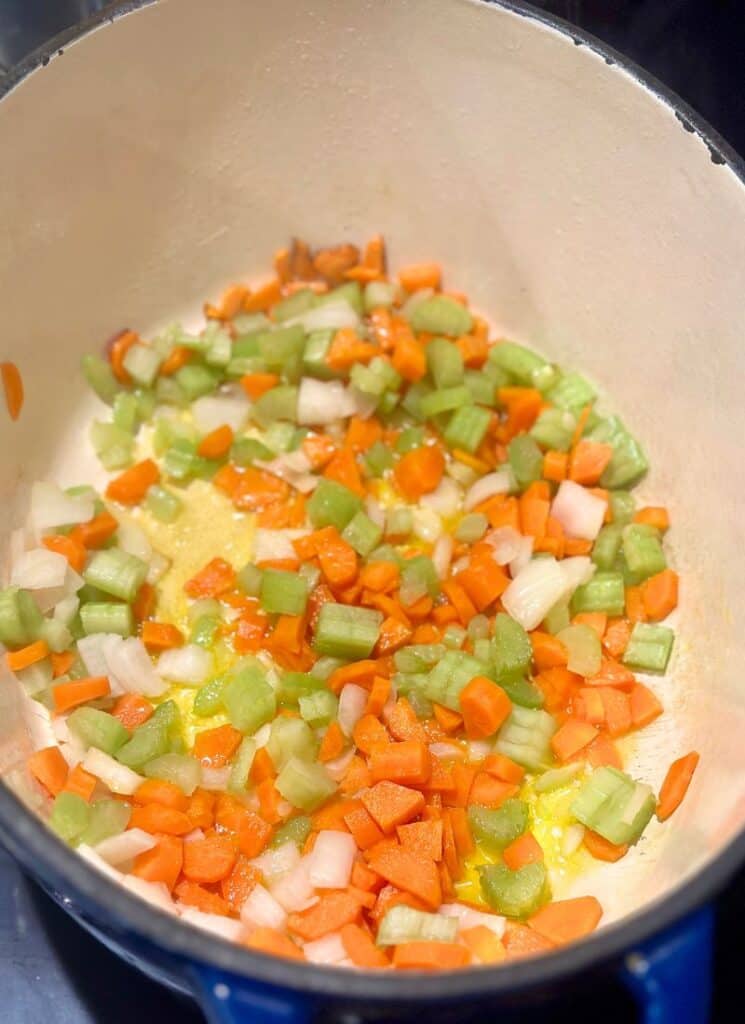 Diced carrots, onion and celery, sauteed in Dutch oven with olive oil.