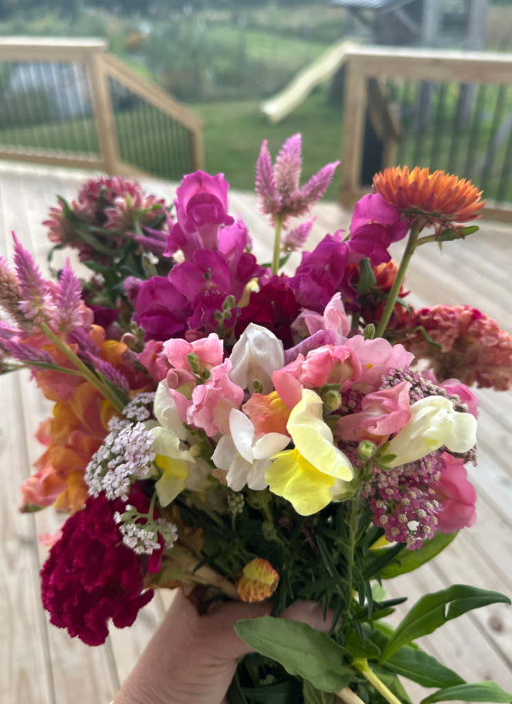 Bouquet of various garden flowers including snapdragons.